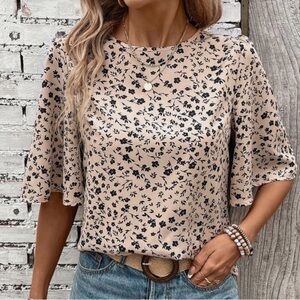 Like new Salanta cream and black floral top